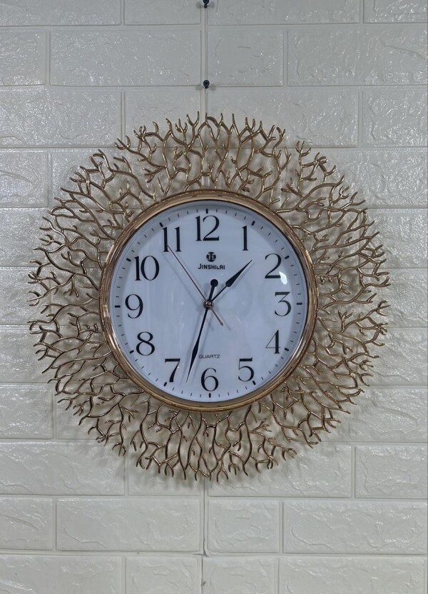 Dekorativ divar saatı